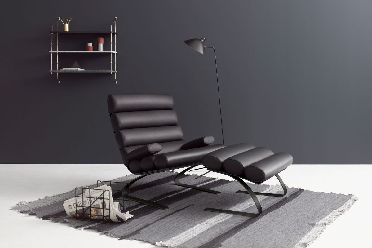 Moderner Schwingsessel mit Hocker Designersessel Leder schwarz